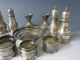 Collectible: Silver: Collection of Sterling including napkin rings, salt and pepper shakers and weighted candlesticks; 650g total weight