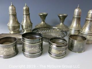 Collectible: Silver: Collection of Sterling including napkin rings, salt and pepper shakers and weighted candlesticks; 650g total weight