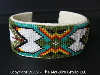 Jewelry: Bracelet: 6.5" beaded, leather lined cuff bracelet