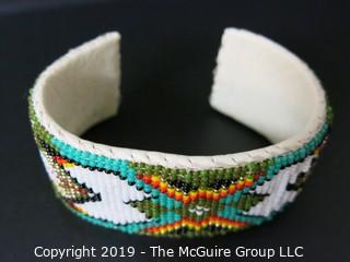 Jewelry: Bracelet: 6.5" beaded, leather lined cuff bracelet