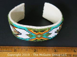 Jewelry: Bracelet: 6.5" beaded, leather lined cuff bracelet