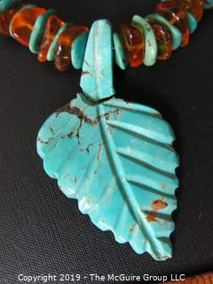 Jewelry: Necklace: silver: 18" turquoise and amber necklace; likely coin silver; carved leaf is broken from strand