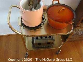 Collection including Chrome Tea Cart, Cast Iron Orange Casserole Pot, Pink Ice Bucket, Vintage Toaster and Misc Utensils 