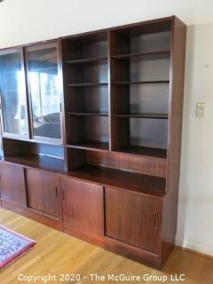 Danish Mid Century Modern (M-C-M) Bookcase with Lower Cabinet Featuring Sliding Doors.  NOTE: THE PHOTO SHOWS THREE (3) SECTIONS SIDE BY SIDE. THIS LOT CONSISTS OF THE MIDDLE, GLASS FRONT SECTION ONLY.   THE LEFT AND RIGHT SECTIONS ARE BEING SOLD AS LOTS 0001A AND 0001B {Each section is 43" wide x 77"tall; lower cabinet is 17" deep, bookcase is 12" deep} 