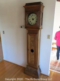 Carved European Oak Grandfather Clock in Case; hand-painted face and handmade movement; 84" tall and 22" wide; untested