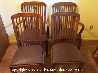 4 European Oak Dining Chairs; 2 with arms; 39 1/2" tall at back x 24" wide at front x 18 1/2" seat height