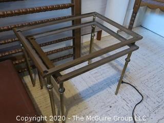 Two Nesting Glass and Cast Iron Tables; larger one is 15 1/2 x 21 1/2 x 16" tall