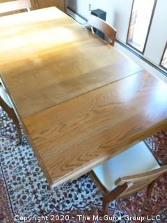 English Oak Dining Table with pull-out end leaves; 40 x 84" with both leaves extended; leaves are each 17 1/2"