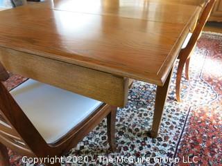 English Oak Dining Table with pull-out end leaves; 40 x 84" with both leaves extended; leaves are each 17 1/2"