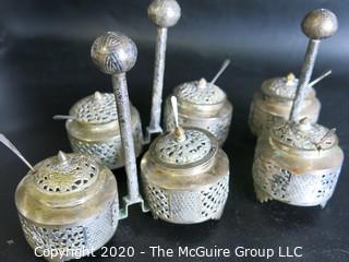 Three Middle Eastern Salt Cellars with Open Work Design, Center Handle and Spoons.  Measures approximately 4" tall including handle