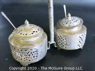 Three Middle Eastern Salt Cellars with Open Work Design, Center Handle and Spoons.  Measures approximately 4" tall including handle