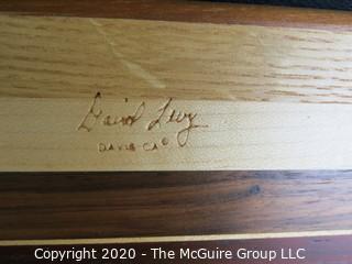 Artisan Made Hardwood Cheese Board made by David Levy of Davis CA, Signed. Measures approximately 19" by 6"