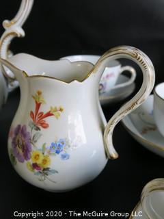 Set of Hand Painted Floral Dresden Porcelain Coffee Service including cups & saucers, demitasse cups & saucers, plates, Coffee Pot, Creamer and Sugar.  Made in Germany