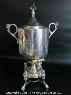 Eastlake Victorian Silver Plated Coffee Urn with Figural Handles and Feet.  Measures approximately 18" tall