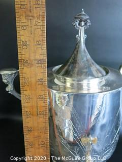 Eastlake Victorian Silver Plated Coffee Urn with Figural Handles and Feet.  Measures approximately 18" tall