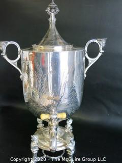 Eastlake Victorian Silver Plated Coffee Urn with Figural Handles and Feet.  Measures approximately 18" tall