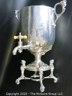 Eastlake Victorian Silver Plated Coffee Urn with Figural Handles and Feet.  Measures approximately 18" tall