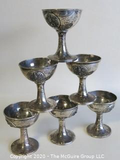 Set of 6 Sterling Silver Goblets with Asian Motif. Each weighs approximately 54 grams for a total of 378 grams. 