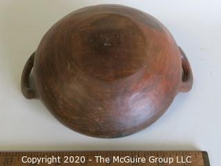 Hand Thrown Double Handle Red Clay Pottery Serving Bowl.  Measures approximately 8" in diameter including handles. Made in Peru. 