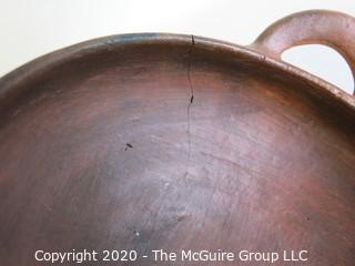 Hand Thrown Double Handle Red Clay Pottery Serving Bowl.  Measures approximately 8" in diameter including handles. Made in Peru. 