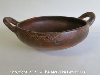 Hand Thrown Double Handle Red Clay Pottery Serving Bowl.  Measures approximately 8" in diameter including handles. Made in Peru. 