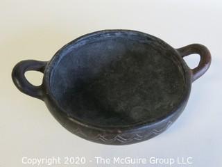 Hand Made Black Clay Bowl with Double Handles. In the style of Barro Negro Pottery of Oaxaca, Mexico. Measures approximately 6 1/2" X 3"