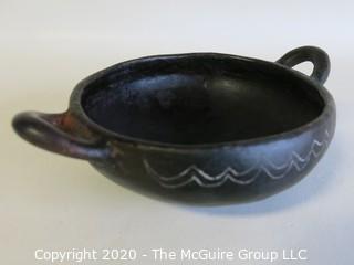 Hand Made Black Clay Bowl with Double Handles. In the style of Barro Negro Pottery of Oaxaca, Mexico. Measures approximately 6 1/2" X 3"