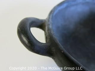 Hand Made Black Clay Bowl with Double Handles. In the style of Barro Negro Pottery of Oaxaca, Mexico. Measures approximately 6 1/2" X 3"