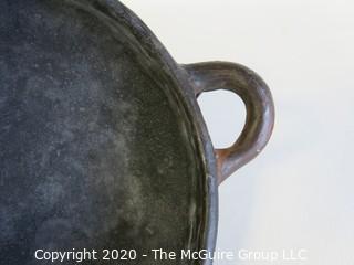 Hand Made Black Clay Bowl with Double Handles. In the style of Barro Negro Pottery of Oaxaca, Mexico. Measures approximately 6 1/2" X 3"