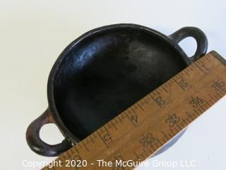 Hand Made Black Clay Bowl with Double Handles. In the style of Barro Negro Pottery of Oaxaca, Mexico. Measures approximately 6 1/2" X 3"