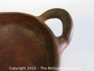 Hand Thrown and Painted Red Clay Double Handle Bowl. Made in Peru. Measures approximately 7 1/2" X 3"