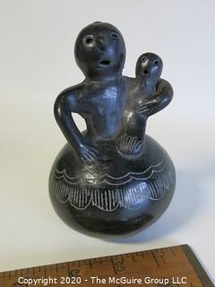 Hand Made Black Clay Pottery Figure of Mother with Child. In the style of Barro Negro Pottery of Oaxaca, Mexico. Measures approximately 3" X 5"