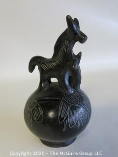 Hand Made Black Clay Pottery Coin Bank with Animal Figures on Top. In the style of Barro Negro Pottery of Oaxaca, Mexico. Measures approximately 7" X 4"