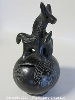 Hand Made Black Clay Pottery Coin Bank with Animal Figures on Top. In the style of Barro Negro Pottery of Oaxaca, Mexico. Measures approximately 7" X 4"