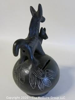 Hand Made Black Clay Pottery Coin Bank with Animal Figures on Top. In the style of Barro Negro Pottery of Oaxaca, Mexico. Measures approximately 7" X 4"