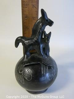 Hand Made Black Clay Pottery Coin Bank with Animal Figures on Top. In the style of Barro Negro Pottery of Oaxaca, Mexico. Measures approximately 7" X 4"