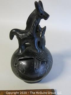 Hand Made Black Clay Pottery Coin Bank with Animal Figures on Top. In the style of Barro Negro Pottery of Oaxaca, Mexico. Measures approximately 7" X 4"