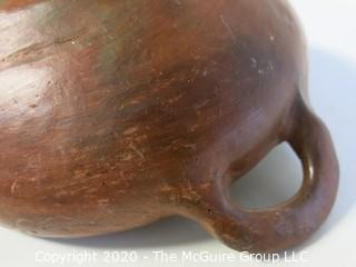 Hand Made Red Clay Pottery Double Handle Bowl. Made in Peru. Measures approximately 8" in diameter including handles