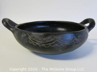 Hand Made Black Clay Pottery Double Handle Bowl. In the style of Barro Negro Pottery of Oaxaca, Mexico. Measures approximately 7" in diameter