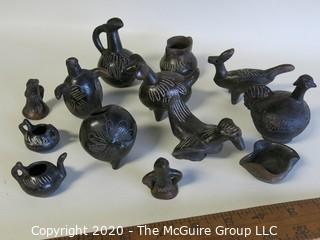 Group of 13 Hand Made Black Clay Pottery Figures and Bowls. In the style of Barro Negro Pottery of Oaxaca, Mexico.