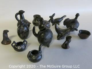 Group of 13 Hand Made Black Clay Pottery Figures and Bowls. In the style of Barro Negro Pottery of Oaxaca, Mexico.