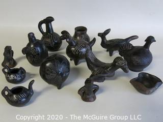 Group of 13 Hand Made Black Clay Pottery Figures and Bowls. In the style of Barro Negro Pottery of Oaxaca, Mexico.