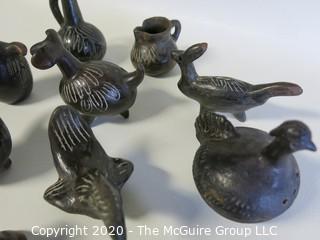 Group of 13 Hand Made Black Clay Pottery Figures and Bowls. In the style of Barro Negro Pottery of Oaxaca, Mexico.