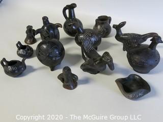 Group of 13 Hand Made Black Clay Pottery Figures and Bowls. In the style of Barro Negro Pottery of Oaxaca, Mexico.