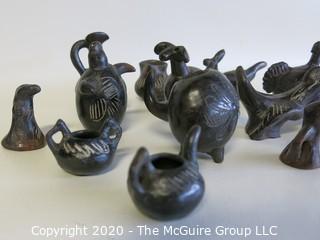 Group of 13 Hand Made Black Clay Pottery Figures and Bowls. In the style of Barro Negro Pottery of Oaxaca, Mexico.