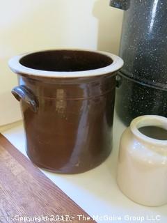 Collection of stoneware jugs as well as a steamer pot 