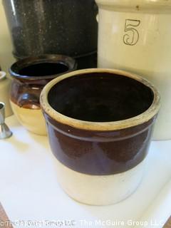 Collection of stoneware jugs as well as a steamer pot 