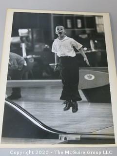 Black & White Photo - Boy Bowling A, Measures 13" x 19" and mounted on picture board. 