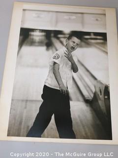 Black & White Photo - Boy Bowling C,  Measures 13" x 19" and mounted on picture board. 