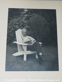 Black & White Photo - Man In Chair, Signed on verso by H G Peck. Measures 10" x 13 1/2" and mounted on picture board. 